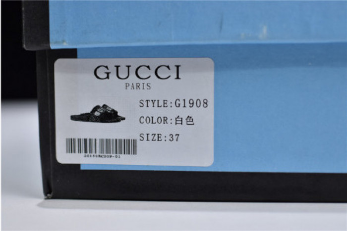 G*u*i slippers